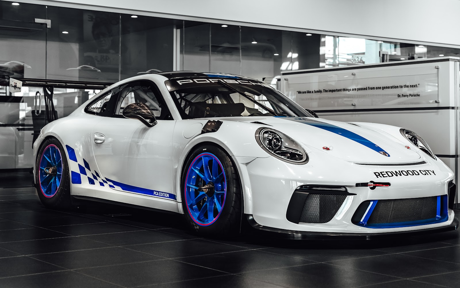 Porsche 911 GT3 RS side profile in showroom